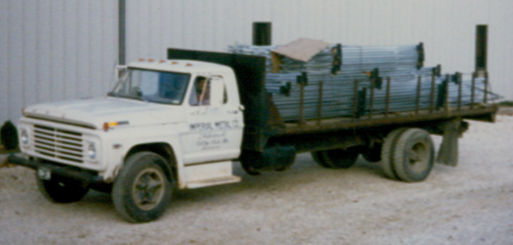 Imperial Metal St. Louis delivery truck loaded with metal handrails